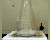 Glycine, a chemical reaction in a container,甘氨酸，容器里的化学反应