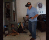 A 81 year old grandfather played the VR (virtual reality) zombie game at home.,一个81岁的老爷爷在家里玩VR（虚拟现实）僵尸游戏玩得超级认真