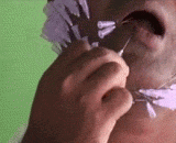 A man in India, with the most needles on his face,印度扎针狂，脸上扎针最多的人