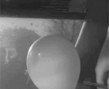 Bursting moment of balloon under water,气球水下爆裂瞬间