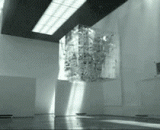 悬空魔方中的零件拼合组装成一辆汽车，太有创意了 - The parts in the suspended cube are assembled into a car, which is very creative.