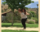 女胖子呼啦圈高手 - A woman with a fat hula hoop