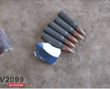 Put the red iron on the bullets to see what happens.,将烧红的铁块放在子弹上，看看会发生什么